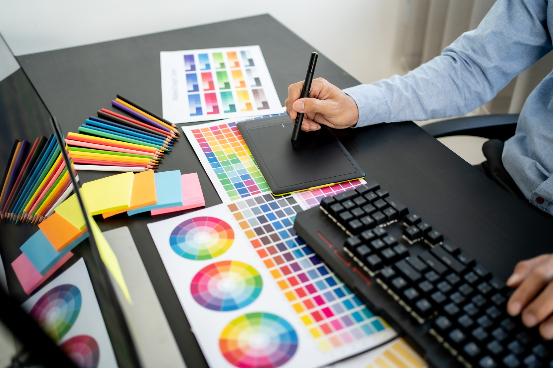 Creative Graphic Designer Working with Colour Swatch Sample